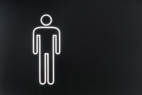 White stick figure outline of a man on a black background.